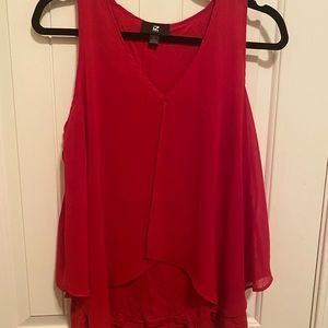 Sleeveless red blouse